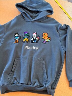 Pleasing Charcoal Gray Pullover Hoodie with Embroidered Characters